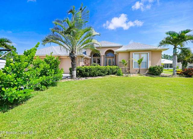 Property at 393 Farley St SW, Palm Bay, FL 32908, 4 beds, 3.5 baths