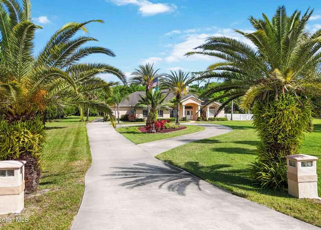 Property at 3430 Heron Ln, Titusville, FL 32780, 4 beds, 3 baths