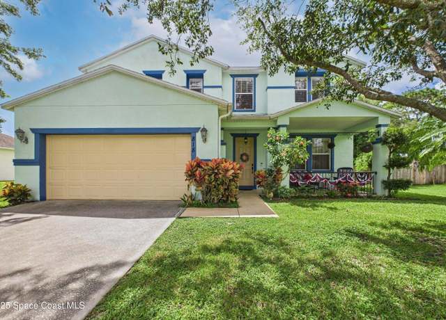 Property at 818 Boeing St NE, Palm Bay, FL 32907, 4 beds, 2.5 baths