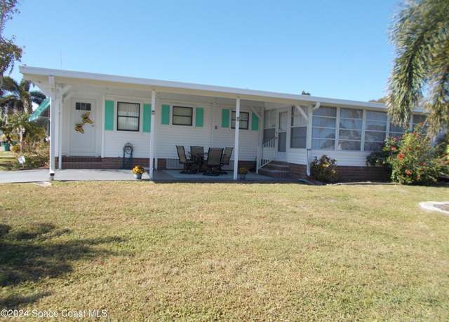 Property at 1100 Sabal Palm Ln W, Barefoot Bay, FL 32976, 2 beds, 2 baths