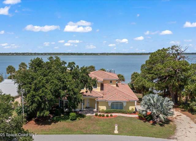 Property at 1999 S Misty Harbor Pl, Merritt Island, FL 32952, 4 beds, 3 baths