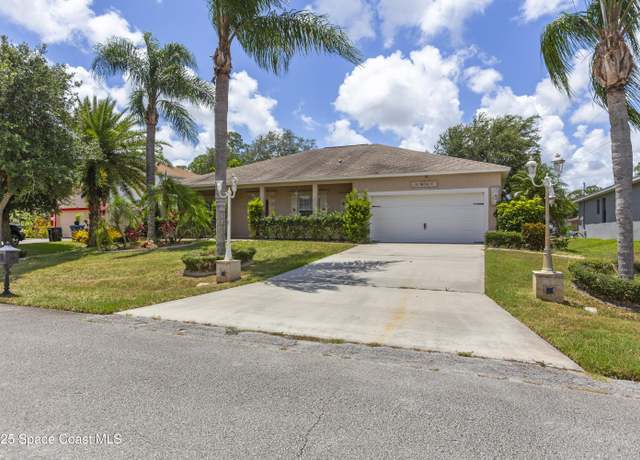 Property at 1870 Parrsboro St NW, Palm Bay, FL 32907, 4 beds, 3 baths