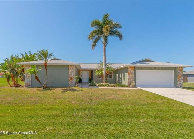 Property at 384 Pepper St NE, Palm Bay, FL 32907, 4 beds, 2 baths