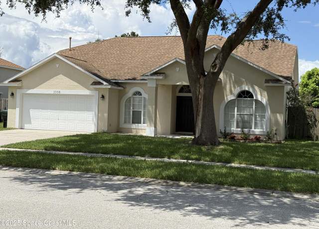 Property at 1008 Pelican Ln, Rockledge, FL 32955, 4 beds, 2 baths