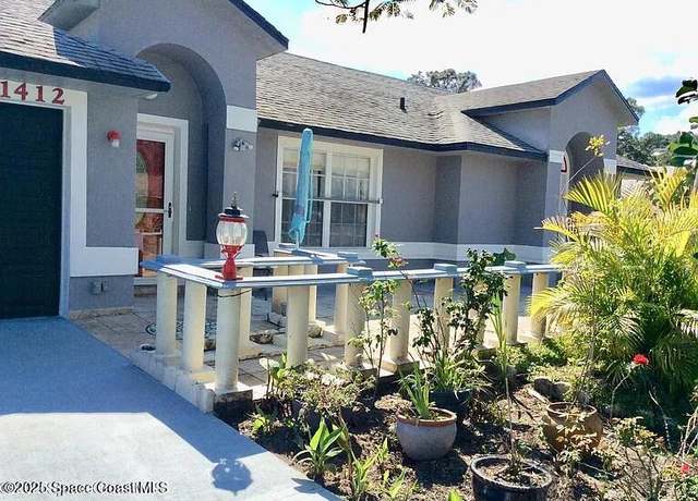 Property at 1412 Napanee St NW, Palm Bay, FL 32907, 4 beds, 2 baths