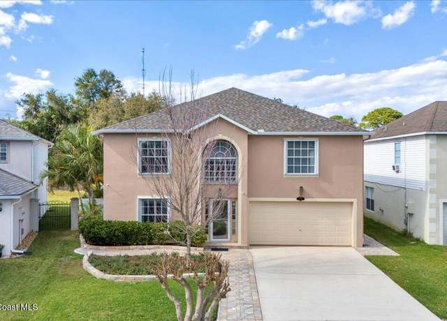 Property at 1209 Macon Dr, Titusville, FL 32780, 4 beds, 3.5 baths