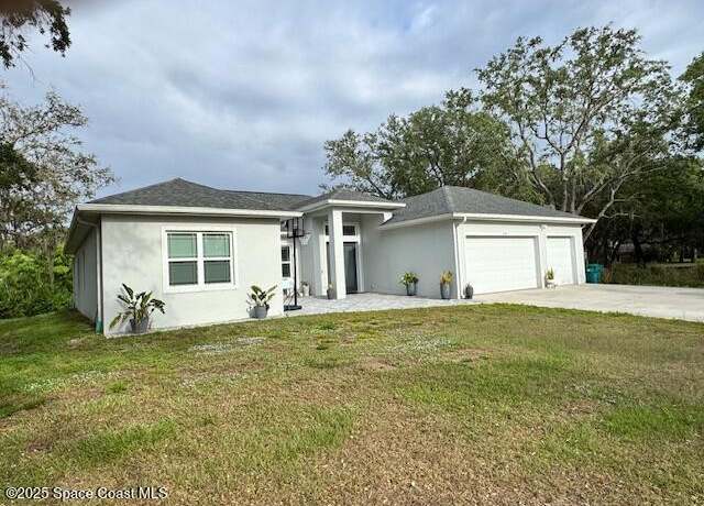 Property at 4235 Navel St, Cocoa, FL 32926, 4 beds, 3 baths