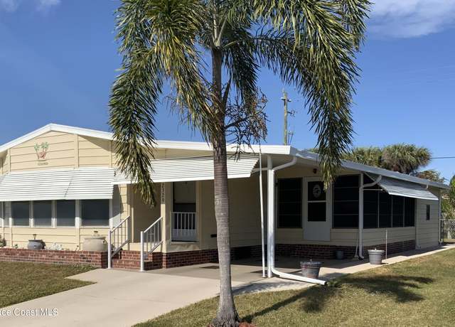 Property at 2329 Coconut Palm Dr NE, Palm Bay, FL 32905, 2 beds, 2 baths