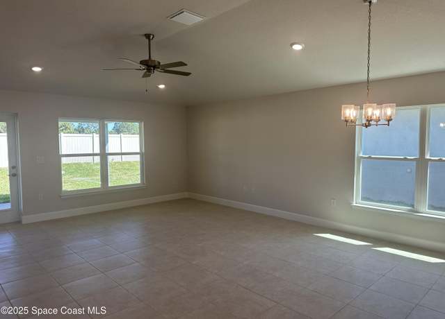 Property at 955 Kylar Dr NW, Palm Bay, FL 32907, 4 beds, 2 baths