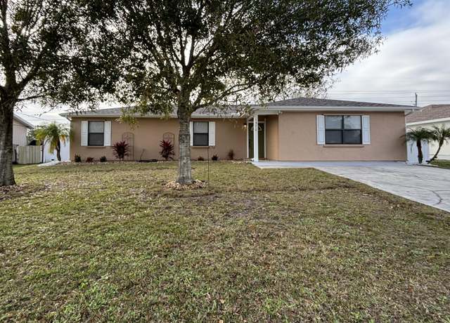 Property at 1370 Elmira Ave NW, Palm Bay, FL 32907, 4 beds, 2 baths