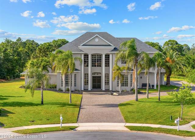 Property at 1028 Dowitcher Ct, Rockledge, FL 32955, 4 beds, 3.5 baths