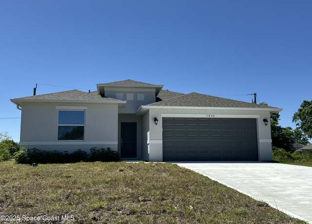 Property at 1450 Paramount Ave SE, Palm Bay, FL 32909, 4 beds, 2 baths
