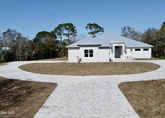 Property at 1611 Lara St NE, Palm Bay, FL 32907, 5 beds, 3 baths
