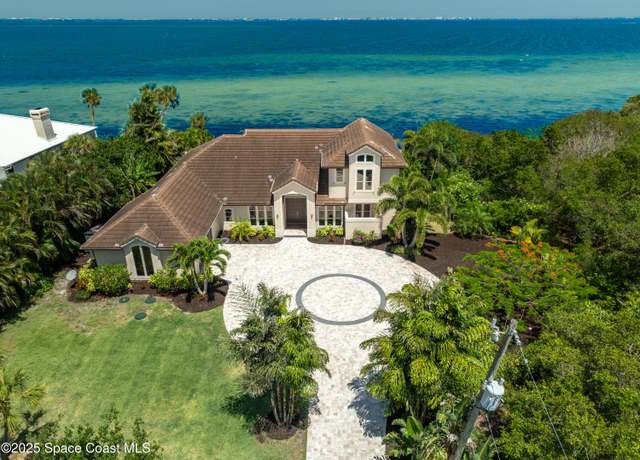Property at 4070 S Tropical Trl, Merritt Island, FL 32952, 4 beds, 3 baths