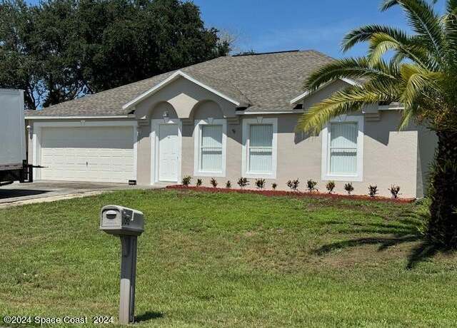 Property at 709 Waikiki Ave NW, Palm Bay, FL 32907, 3 beds, 2 baths