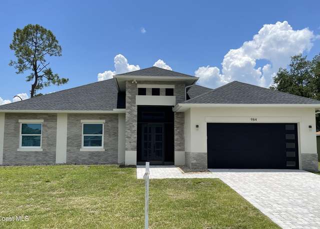 Property at 984 Hattaras Ter SE, Palm Bay, FL 32909, 4 beds, 2 baths