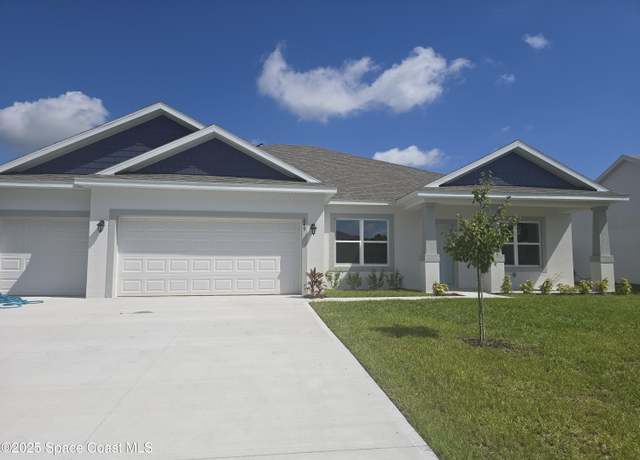 Property at 649 Banks St NW, Palm Bay, FL 32907, 4 beds, 3 baths