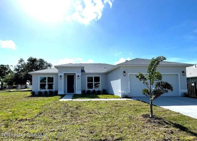 Property at 2420 Country Club Rd, Melbourne, FL 32901, 4 beds, 2 baths