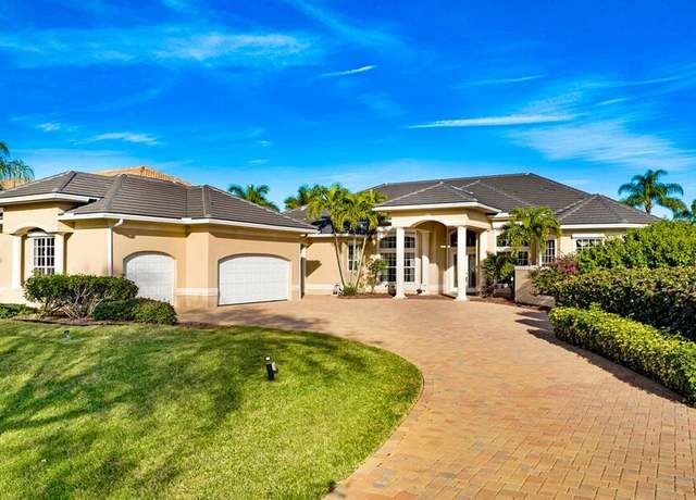 Property at 124 Lansing Island Dr, Indian Harbour Beach, FL 32937, 5 beds, 5 baths
