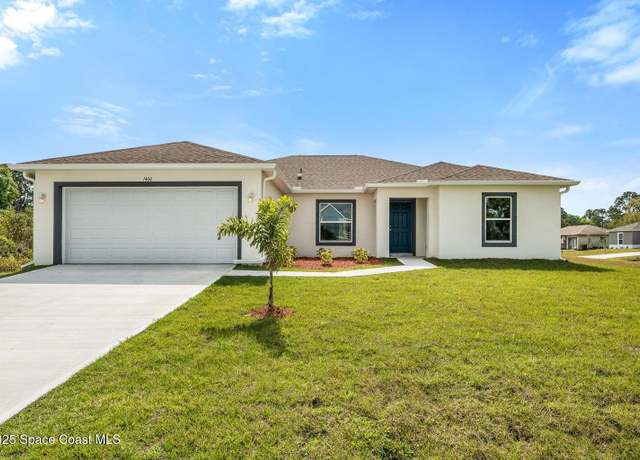 Property at 440 Helicon Ave NW #14, Palm Bay, FL 32907, 4 beds, 2 baths