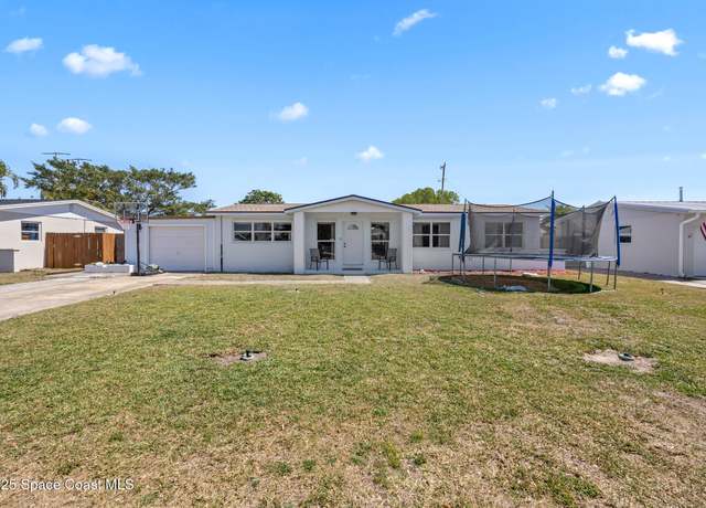 Property at 210 Melaleuca Dr, Satellite Beach, FL 32937, 4 beds, 3 baths