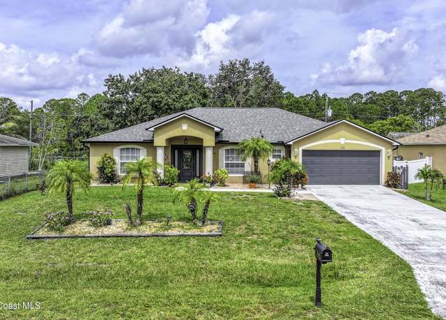 Property at 1060 Fairplay Ave NW, Palm Bay, FL 32907, 4 beds, 2 baths