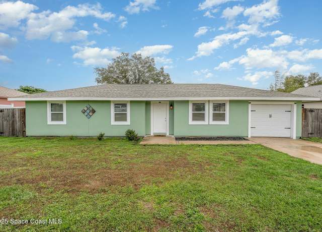 Property at 6075 Grissom Pkwy, Port Saint John, FL 32927, 3 beds, 2 baths