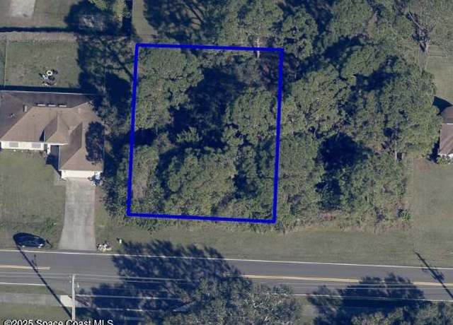 Property at 697 Americana Blvd NW, Palm Bay, FL 32907