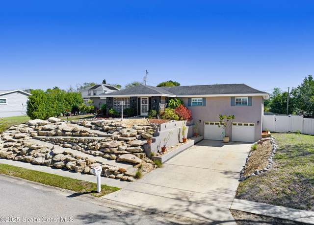 Property at 1631 Carriage Dr W, Titusville, FL 32796, 4 beds, 2 baths