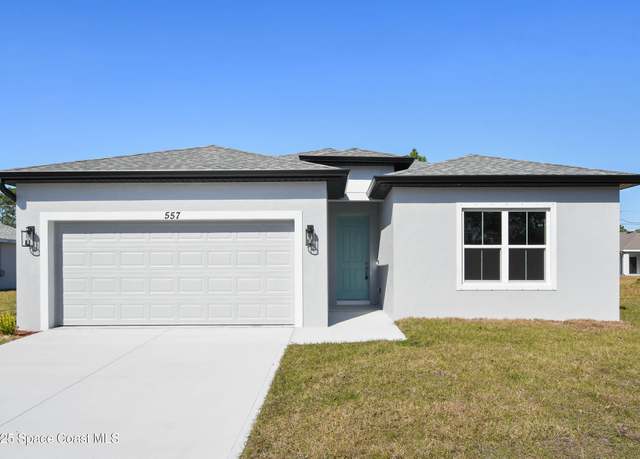 Property at 557 Escarole St SE, Palm Bay, FL 32909, 4 beds, 3 baths