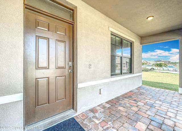 Property at 870 Remington Greene Dr SE, Palm Bay, FL 32909, 5 beds, 3 baths