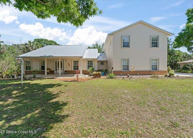 Property at 581 Drexel Ave NE, Palm Bay, FL 32907, 4 beds, 3 baths