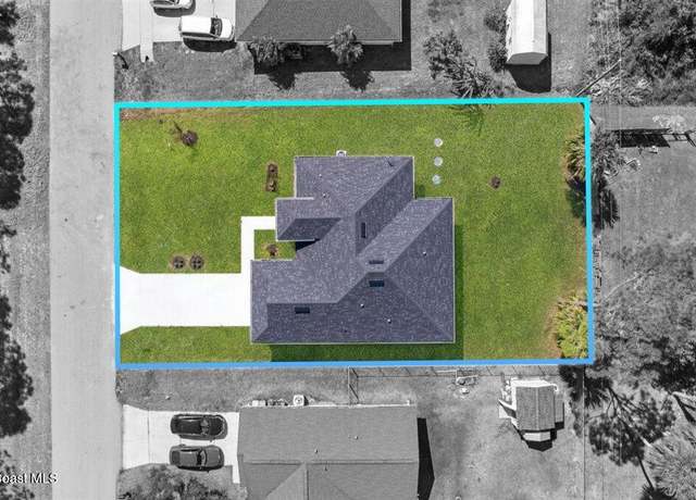 Property at 1751 Nandina Ct NW, Palm Bay, FL 32907, 4 beds, 2.5 baths