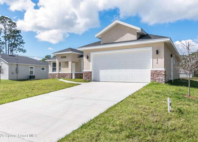 Property at 1658 Hamilton Ave SW, Palm Bay, FL 32908, 4 beds, 3 baths
