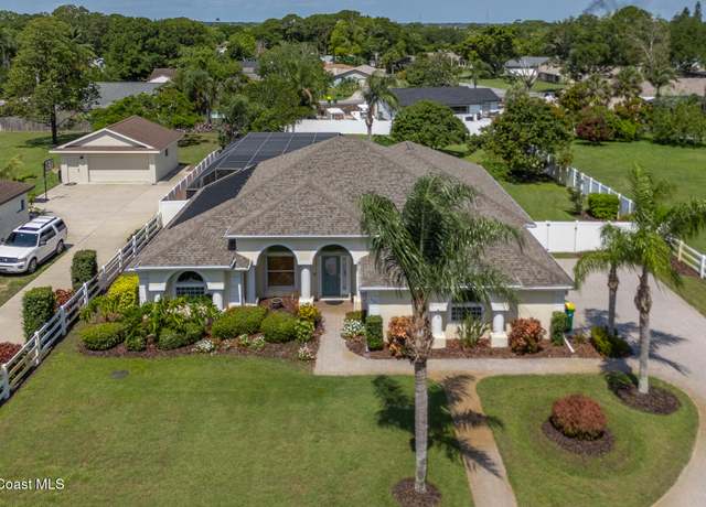 Property at 3125 N Tropical Trl, Merritt Island, FL 32953, 4 beds, 3 baths