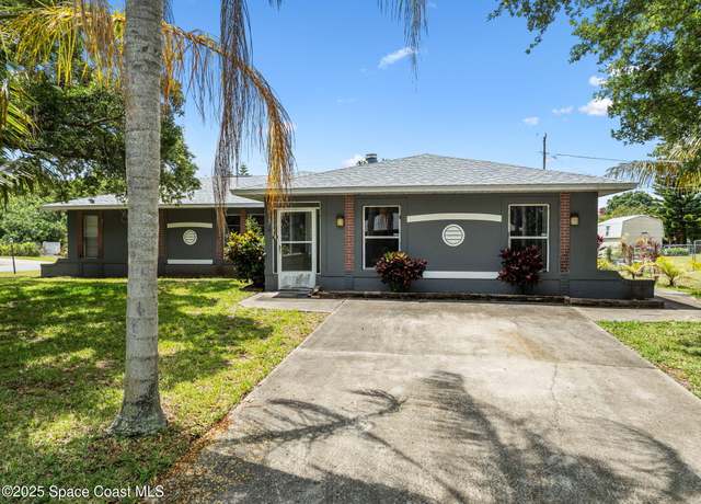 Property at 1554 Nona St NE, Palm Bay, FL 32907, 5 beds, 4 baths
