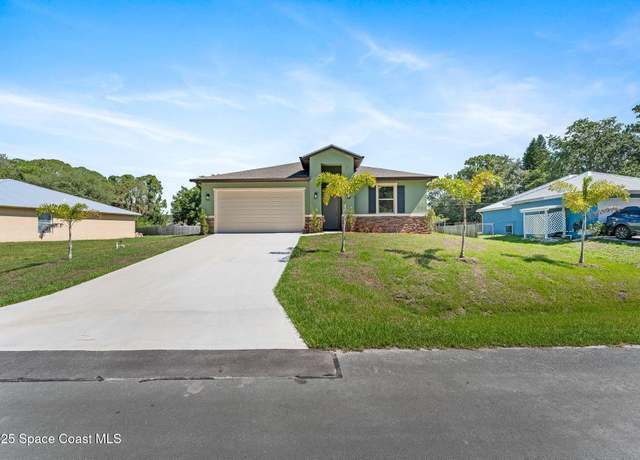 Property at 563 Holmes Ave NW, Palm Bay, FL 32907, 3 beds, 2.5 baths