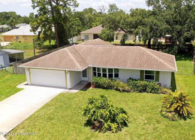 Property at 473 Americana Blvd NW, Palm Bay, FL 32907, 3 beds, 2 baths