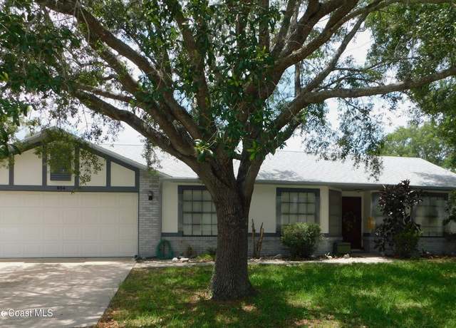 Property at 854 Custer St NW, Palm Bay, FL 32907, 4 beds, 2 baths