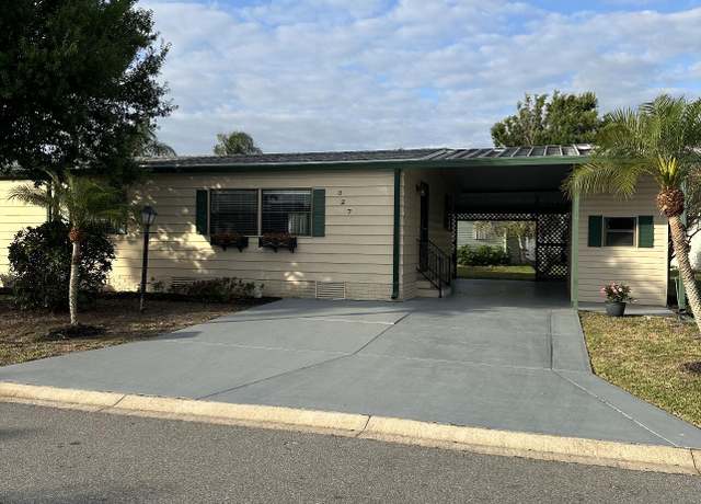 Property at 327 Macadamia Dr, Barefoot Bay, FL 32976, 2 beds, 2 baths