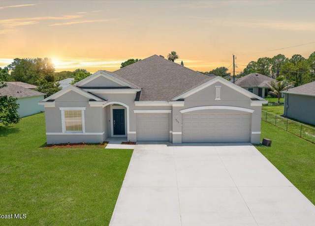 Property at 922 Raleigh Rd SE, Palm Bay, FL 32909, 4 beds, 3 baths