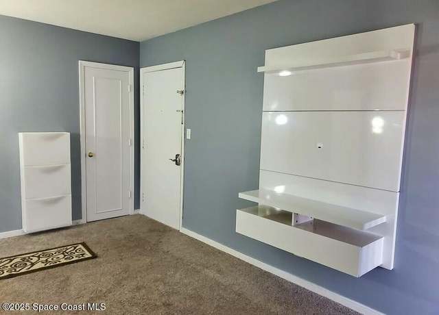 Property at 125 E Colonial Ct Unit D, Indian Harbour Beach, FL 32937, 2 beds, 1 bath