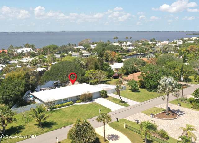 Property at 1640 Bay Shore Dr, Cocoa Beach, FL 32931, 4 beds, 3.5 baths