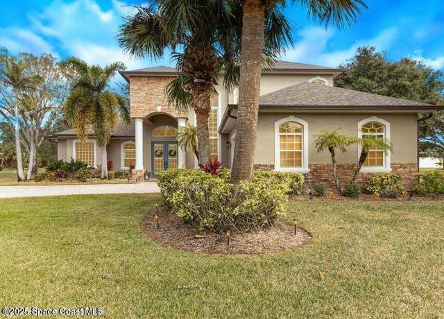 Property at 2067 Windbrook Dr SE, Palm Bay, FL 32909, 4 beds, 3 baths