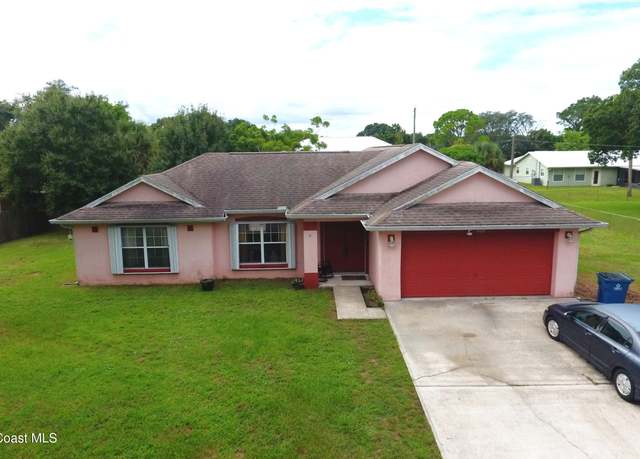 Property at 816 Hawser St NE, Palm Bay, FL 32907, 3 beds, 2 baths