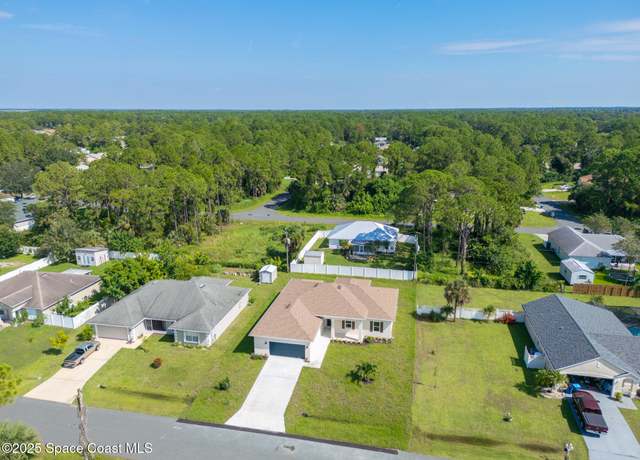 Property at 1541 Madison Rd NW, Palm Bay, FL 32907, 4 beds, 2 baths