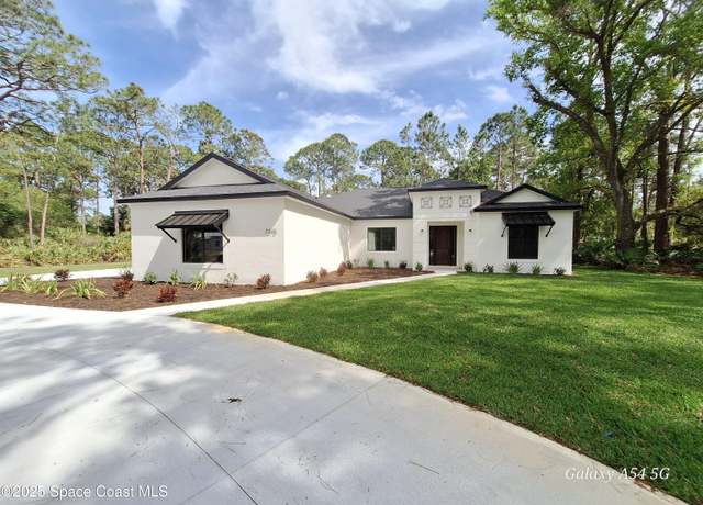 Property at 7275 Turkey Point Dr, Titusville, FL 32780, 5 beds, 3.5 baths