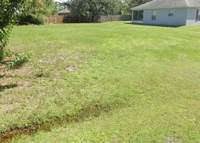 Property at 411 Bargello Ave SE, Palm Bay, FL 32909