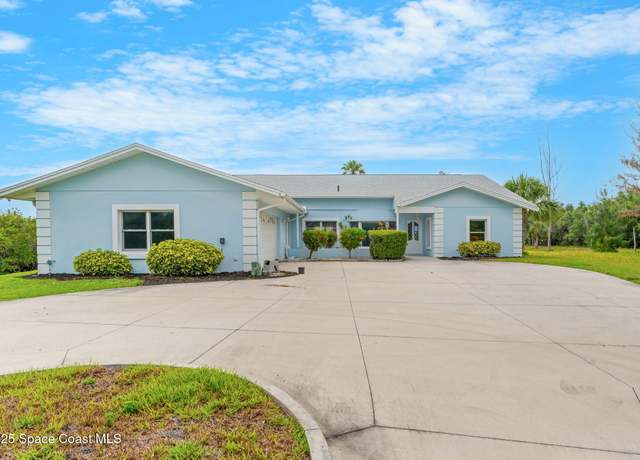 Property at 9605 S Tropical Trl, Merritt Island, FL 32952, 3 beds, 2.5 baths