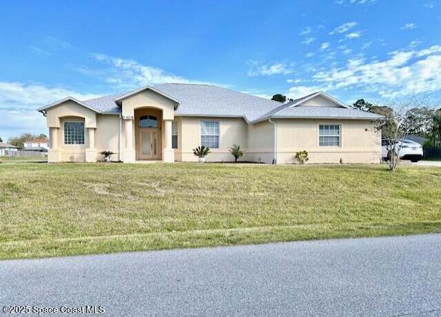 Property at 1401 Rila St SE, Palm Bay, FL 32909, 5 beds, 3 baths